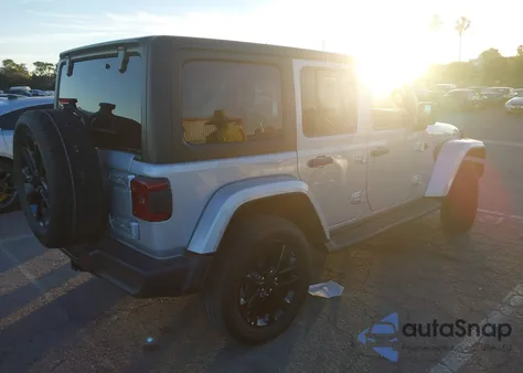 2023 Jeep Wrangler 4Xe Sahara 4X4 from USA, damaged, VIN 1C4JJXP65PW630477